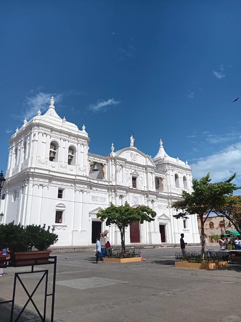 Grand white cathedral and plaza on a sunny day