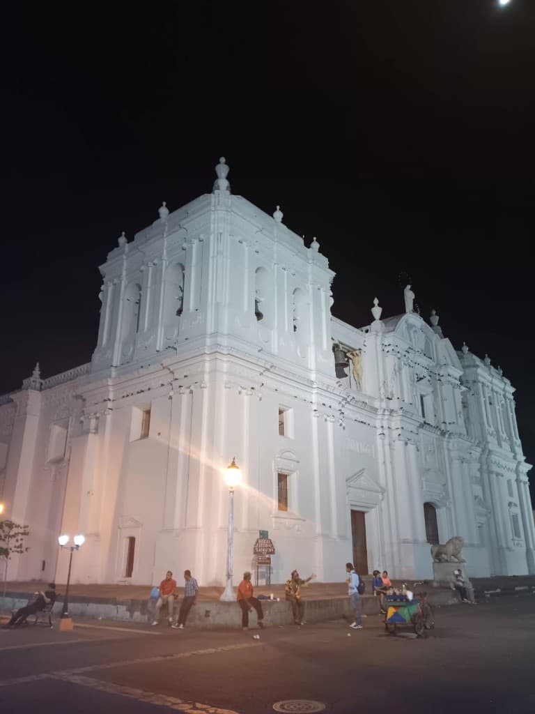 Illuminated cathedral at night in the city square